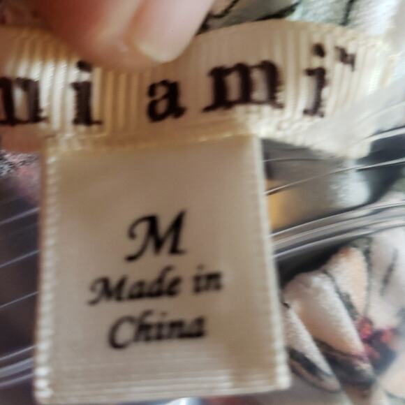 MIAMI M beige green purple red and black floral design with a blue border at hem - Picture 5 of 5